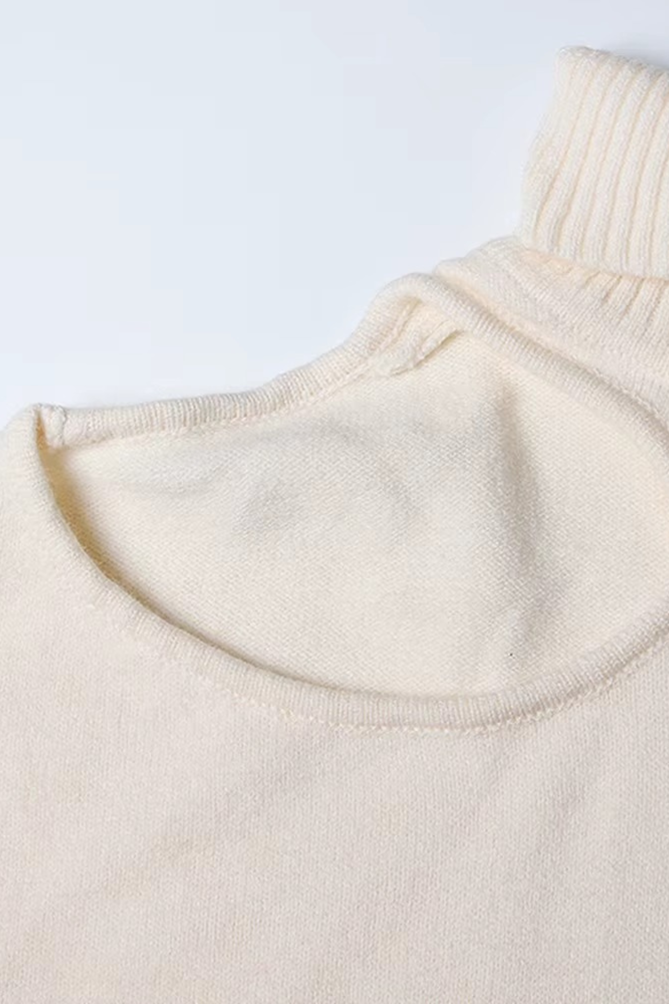 Oversized Cut-Out Turtleneck Sweater